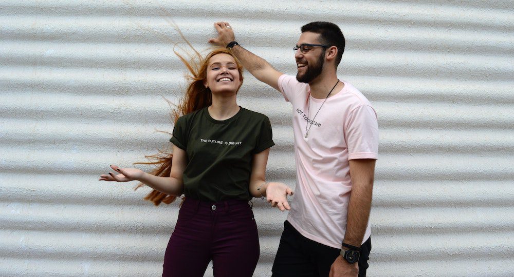 man talking to woman